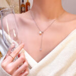 韩国新款简约水滴形锆石项链女高级感抽拉式钛钢珍珠锁骨链颈链