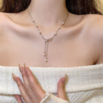 轻奢小众设计感蝴蝶结钛钢项链ins潮百搭气质珍珠流苏锁骨链颈链