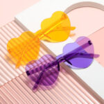 Kính râm Jelly Peach Heart Nữ Kính râm Đại dương một mảnh không gọng Kính râm Tình yêu Kính râm Dễ thương Hài hước Bán buôn