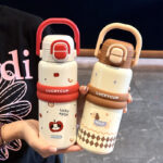 Cốc giữ nhiệt cho bé gái có giá trị cao Cốc uống nước đôi có ống hút kiểu mới 2025 ấm cầm tay trẻ em dễ thương