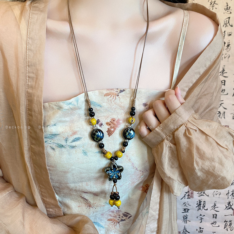 O1CN01ODQw1Q2KtjG9UMaaV_2580729615-0-cib Vòng cổ hoa gốm sứ cổ điển kiểu Trung Quốc mới chuỗi áo len tua rua dài phong cách dân tộc Nữ Phụ kiện cao cấp - Ảnh 1