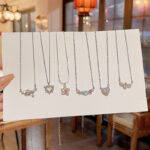 Hàn Quốc phong cách mới Vòng cổ ngọc trai nữ tất cả các trận đấu khí chất tình yêu Vòng xương đòn thép titan thiết kế cao cấp cảm giác bán buôn Vòng cổ