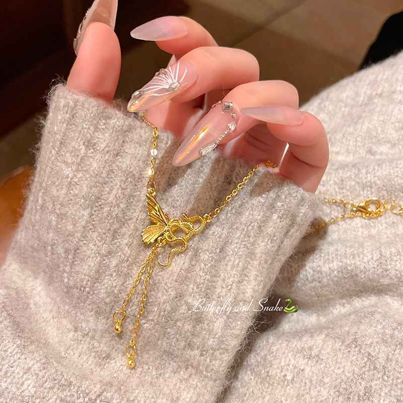 O1CN01SwiaOf2KtjCw9TbPN_2580729615-0-cib 新中式中古风小蛇蝴蝶项链女轻奢小众高级感长款流苏锁骨链颈链 - Ảnh 1