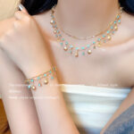 Con gái của biển màu xanh Zircon Vòng cổ vỏ sò vàng nữ sang trọng nhẹ nhàng sang trọng thích hợp cao cấp đa năng khí chất trang sức vòng tay