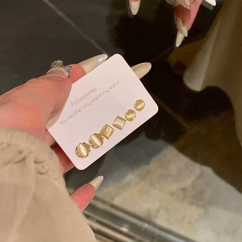 O1CN01pusZ0T2Ktj9iDYVYS_2580729615-0-cib S925 kim bạc đơn giản khí chất hoa tai mắt mèo nữ cao cấp cảm giác học sinh Bộ khuyên tai hoa tai bán buôn - Ảnh 1