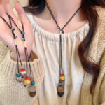 Dây chuyền dây chuyền áo len tua rua dài phong cách Trung Quốc cổ đại phong cách Trung Quốc mới Dây chuyền xương đòn phong cách dân tộc Dây chuyền hot trên mạng