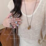 Vòng cổ mắt hổ bằng thép titan tua dài Hàn Quốc